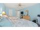Bedroom with twin beds and a rattan dresser at 503 20Th Ave. N # 55B, North Myrtle Beach, SC 29582
