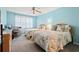 Bedroom with twin beds, a ceiling fan, and light blue walls at 503 20Th Ave. N # 55B, North Myrtle Beach, SC 29582