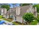 Two-story townhouse showcasing its manicured landscaping and inviting entrance, complete with well-maintained grounds at 503 20Th Ave. N # 55B, North Myrtle Beach, SC 29582