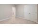 Bedroom featuring neutral carpet and an ensuite bathroom at 5031 Vinesia Dr., Myrtle Beach, SC 29579