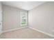 Bedroom featuring neutral carpet, a window, and fresh paint at 5031 Vinesia Dr., Myrtle Beach, SC 29579