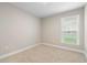 Bedroom with neutral carpeting, a window, and fresh paint at 5031 Vinesia Dr., Myrtle Beach, SC 29579
