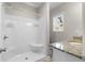 Bathroom with shower featuring granite countertop and a window for natural light at 505 Beaty St., Conway, SC 29526
