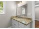 A vanity with granite top and modern fixtures brightens this bathroom space at 505 Beaty St., Conway, SC 29526