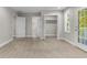 Open bedroom design featuring neutral carpet, and a doorway view into the bathroom at 505 Beaty St., Conway, SC 29526