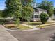 A corner lot features a two-story home with double porches and neat landscaping at 505 Beaty St., Conway, SC 29526