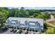 Aerial view of townhome complex nestled amongst lush green trees and landscaping at 510 Fairwood Lakes Dr. # 923G, Myrtle Beach, SC 29588