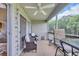 Relaxing screened patio with ceiling fan and comfortable wicker chairs at 510 Fairwood Lakes Dr. # 923G, Myrtle Beach, SC 29588