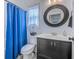 Clean bathroom with a vanity, sink, toilet, and a blue shower curtain at 548 Fox Chase Dr., Conway, SC 29527