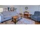 Bright living room with hardwood floors, seating, and traditional decor at 548 Fox Chase Dr., Conway, SC 29527