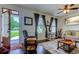 Bright living room with hardwood floors, comfortable seating, and open layout at 548 Fox Chase Dr., Conway, SC 29527