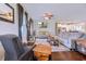 Bright living room with hardwood floors and comfortable seating at 548 Fox Chase Dr., Conway, SC 29527