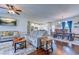 Bright living room with hardwood floors, seating, and dining area at 548 Fox Chase Dr., Conway, SC 29527