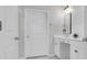 Bright bathroom featuring a marble countertop, white cabinets, and modern finishes at 553 Pier Ct., Longs, SC 29568