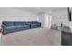 Spacious living room with cozy seating, a 'PLAY' sign, and plenty of natural light at 553 Pier Ct., Longs, SC 29568