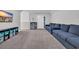 Cozy Gathering room featuring comfortable sofas and play area with toy storage at 553 Pier Ct., Longs, SC 29568