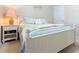Comfortable bedroom features a white bed frame and simple decor at 5822 Longwood Dr. # 104, Murrells Inlet, SC 29576