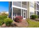 Charming condo featuring a screened porch perfect for enjoying the outdoors in a beautiful community at 5822 Longwood Dr. # 104, Murrells Inlet, SC 29576