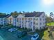 Attractive condo with multiple balconies and ample parking, offering a convenient and stylish living experience at 5822 Longwood Dr. # 104, Murrells Inlet, SC 29576