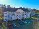 Well-maintained condo with balconies and convenient parking, perfect for comfortable community living at 5822 Longwood Dr. # 104, Murrells Inlet, SC 29576
