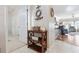Entryway with wood shelving, decorative touches and views into the adjacent living area at 5822 Longwood Dr. # 104, Murrells Inlet, SC 29576