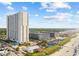 Aerial view of a coastal resort with high-rise condos, pools, and beach access at 5905 S Kings Hwy. # 1816 Rt, Myrtle Beach, SC 29575