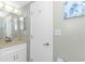 This bathroom includes a single sink vanity and unique art at 5905 S Kings Hwy. # 1816 Rt, Myrtle Beach, SC 29575