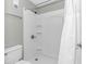 This bathroom features a walk-in shower with white shower curtain at 5905 S Kings Hwy. # 1816 Rt, Myrtle Beach, SC 29575