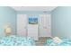 This bedroom features two beds and a TV at 5905 S Kings Hwy. # 1816 Rt, Myrtle Beach, SC 29575