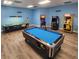 Spacious game room featuring a pool table, air hockey, and arcade games at 5905 S Kings Hwy. # 1816 Rt, Myrtle Beach, SC 29575
