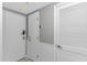 Hallway featuring tile flooring, utility closet, thermostat and two entry doors at 5905 S Kings Hwy. # 1816 Rt, Myrtle Beach, SC 29575