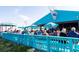 Relaxed outdoor restaurant with ample seating under umbrellas and a lively atmosphere at 5905 S Kings Hwy. # 1816 Rt, Myrtle Beach, SC 29575