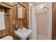 Cozy bathroom features a shower and neutral-toned sink at 6401 N Ocean Blvd., Myrtle Beach, SC 29572