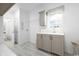 Convenient laundry room area featuring a sink, cabinets, and space for a washer and dryer at 8204 S Highway 905, Longs, SC 29568