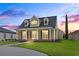 Charming home with a well-manicured lawn and inviting front porch at 853 Bluffview Dr., Myrtle Beach, SC 29579