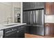 Stylish kitchen with a center island, custom cabinets, and stainless steel appliances at 853 Bluffview Dr., Myrtle Beach, SC 29579