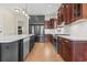 Modern kitchen featuring a center island, custom cabinets, and stainless steel appliances at 853 Bluffview Dr., Myrtle Beach, SC 29579