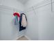 Walk-in closet with wire shelving for clothing and accessory storage at 905 Sewing Bee Pl., Little River, SC 29566