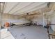 Spacious garage featuring a boat, ample storage, and a clean, organized space perfect for hobbyists at 905 Sewing Bee Pl., Little River, SC 29566