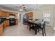 Well-equipped kitchen with plenty of cabinets, stainless steel refrigerator, and a cozy dining space at 905 Sewing Bee Pl., Little River, SC 29566