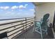 Relaxing ocean-facing balcony with comfortable seating and ocean views at 920 N Waccamaw Dr. # 1302, Garden City Beach, SC 29576