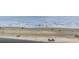 Beautiful ocean beach with scattered beachgoers enjoying the weather at 920 N Waccamaw Dr. # 1302, Garden City Beach, SC 29576