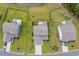 Aerial view showcasing the home's location among well-manicured lawns and neighboring properties at 933 Wild Leaf Loop, Conway, SC 29526