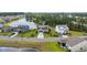 Aerial view of a house with a pond and well-maintained landscaping in a residential neighborhood at 933 Wild Leaf Loop, Conway, SC 29526