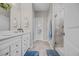 Elegant bathroom with a dual sink vanity, tiled shower, and modern fixtures for a spa-like experience at 933 Wild Leaf Loop, Conway, SC 29526