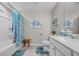 Bathroom with a tub and shower combo, tile floors and wainscoting at 933 Wild Leaf Loop, Conway, SC 29526