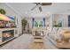 Spacious living room with an electric fireplace, plush seating, and stylish decor at 933 Wild Leaf Loop, Conway, SC 29526