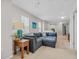 Comfortable living room featuring a plush sectional sofa and bright natural light at 933 Wild Leaf Loop, Conway, SC 29526