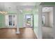 Inviting entryway featuring hardwood floors, white columns, and ample natural light at 1009 Hopscotch Ln., Conway, SC 29526
