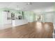 Open-concept kitchen featuring a large island, stainless steel appliances, and white cabinetry at 1009 Hopscotch Ln., Conway, SC 29526